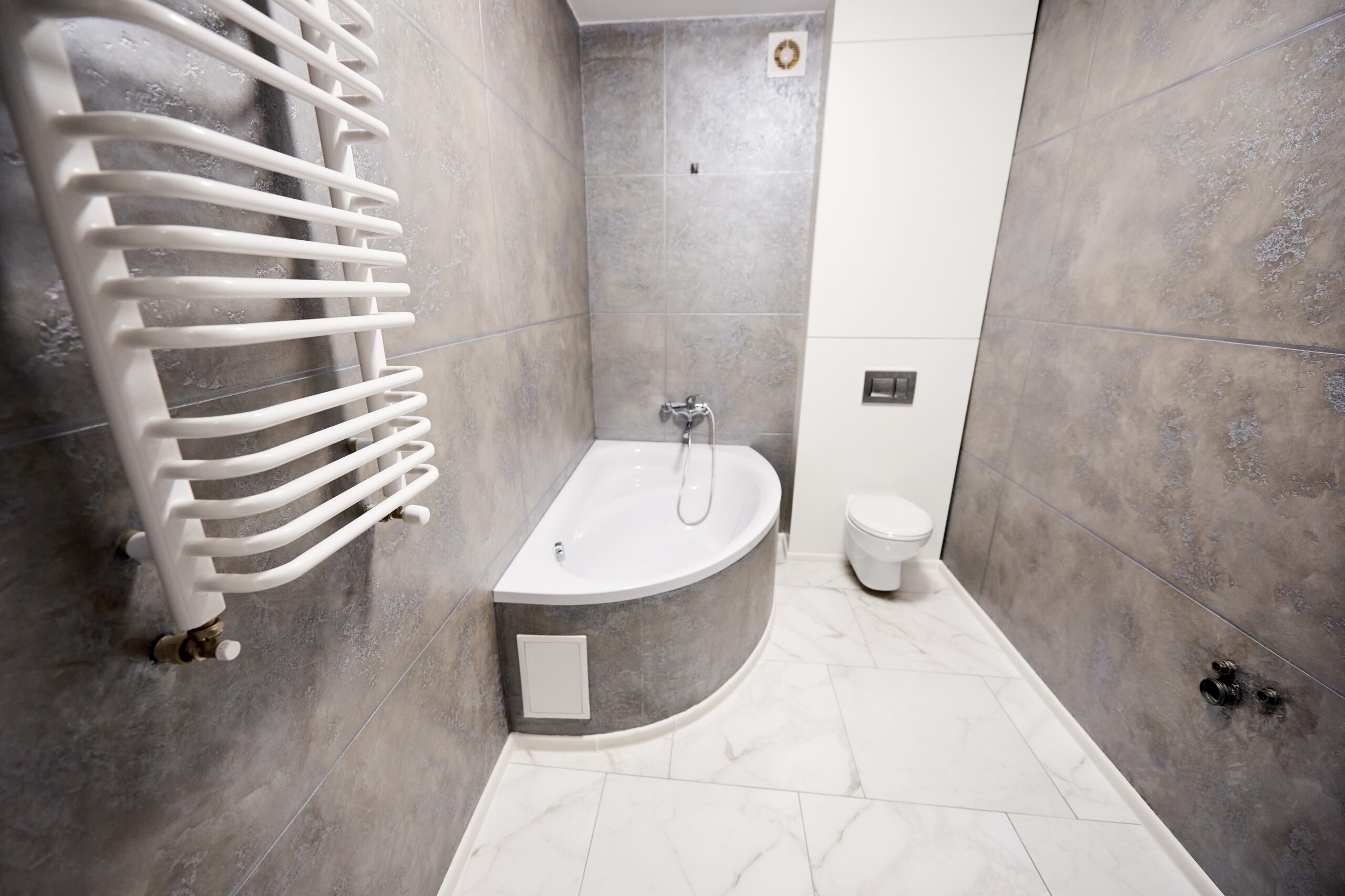 Bathroom of modern apartment before and after renovation.